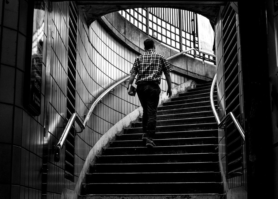 Man walking up stairs